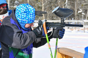 Malcom Silver-VanMeter takes aim at the Paintball Biathlon. Photo by Randy Witwick.